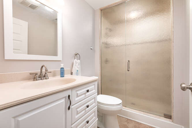7 Windward Way Ottawa, IL 61350 - Photo 37 of 47 a bathroom with a granite countertop sink toilet a mirror and shower