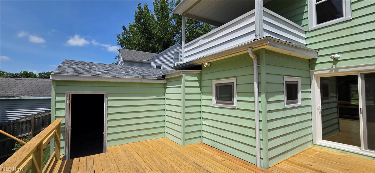 9964 East River Road Elyria, OH 44035 - Photo 42 of 45 Outside view of balcony, door to the garage and slider