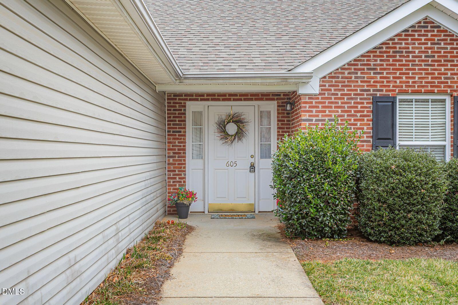 605 Huntingdon Street Elon, NC 27244 - Photo 2 of 18 a front view of a house