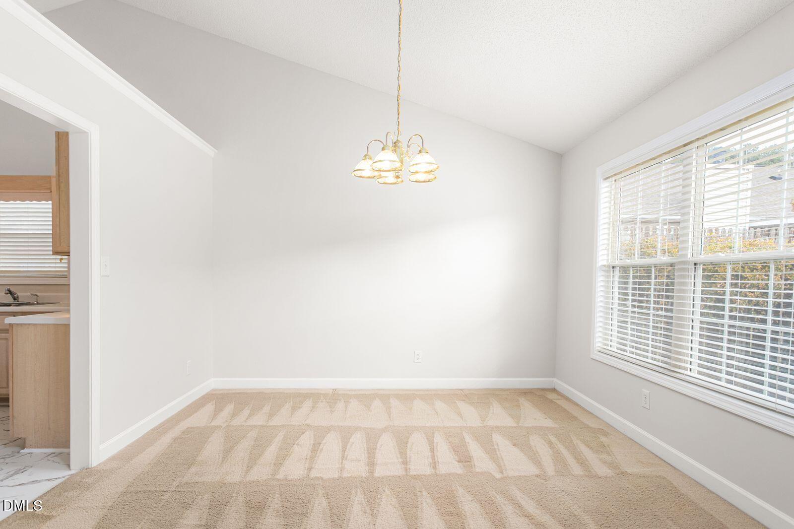 605 Huntingdon Street Elon, NC 27244 - Photo 7 of 18 a view of a room with a window