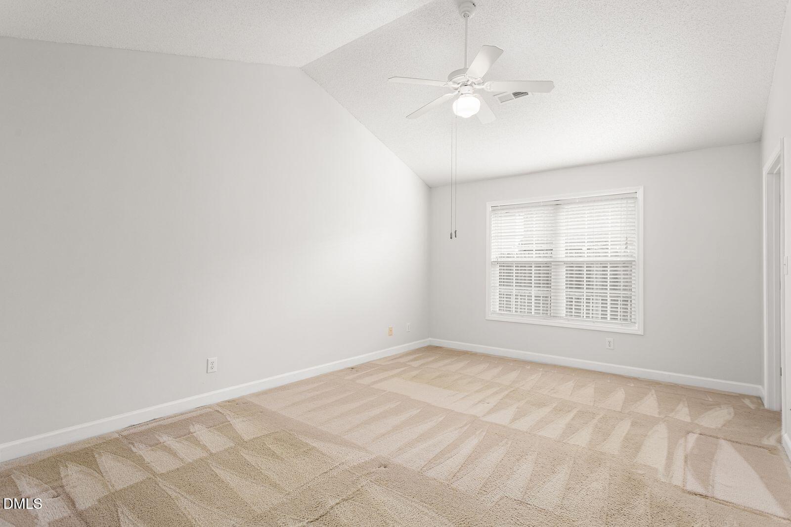 605 Huntingdon Street Elon, NC 27244 - Photo 9 of 18 a view of an empty room with a window