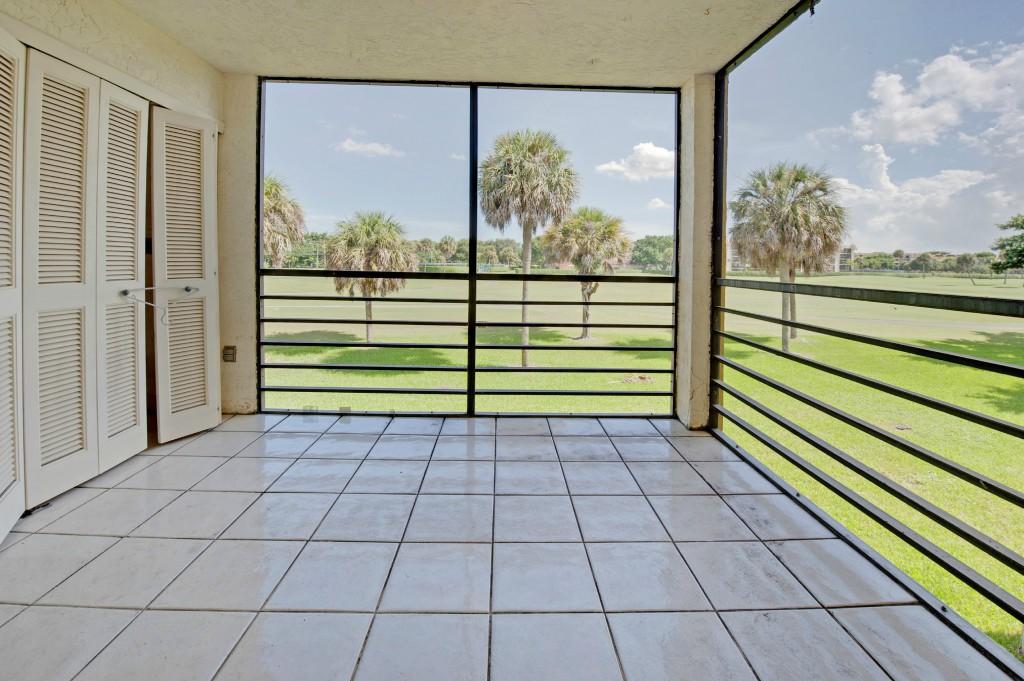 9440 Southwest 8th Street, Unit 220 Boca Raton, FL 33428 - Photo 6 of 9 a view of a room with window