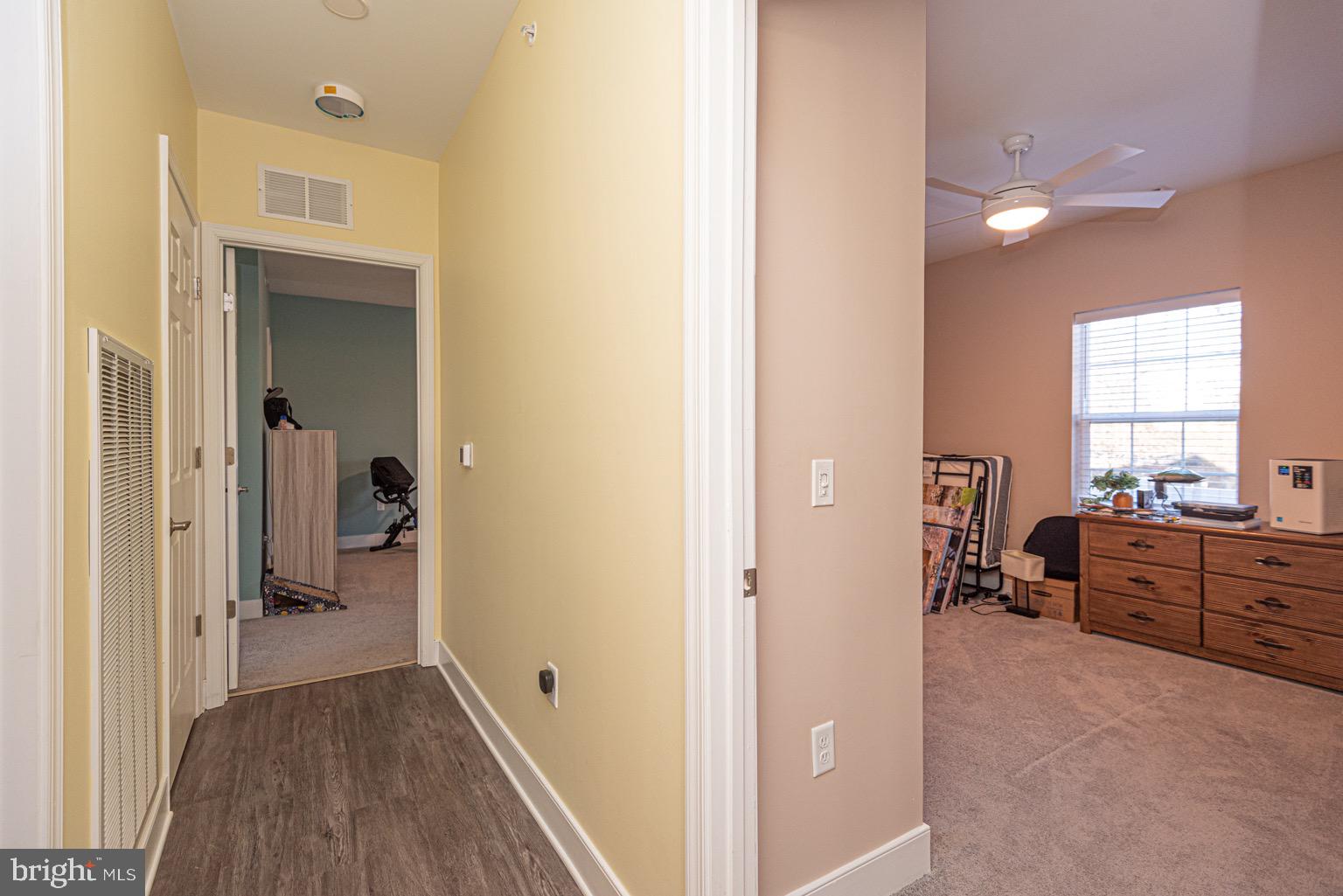 30609 Cedar Neck Road, Unit 3103 Ocean View, DE 19970 - Photo 15 of 39 a view of a hallway to a livingroom and a window