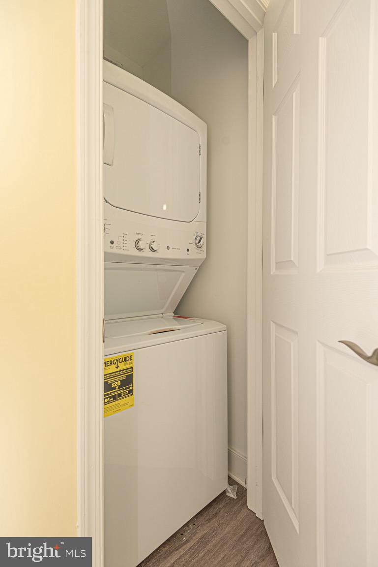 30609 Cedar Neck Road, Unit 3103 Ocean View, DE 19970 - Photo 17 of 39 a utility room with dryer and washer
