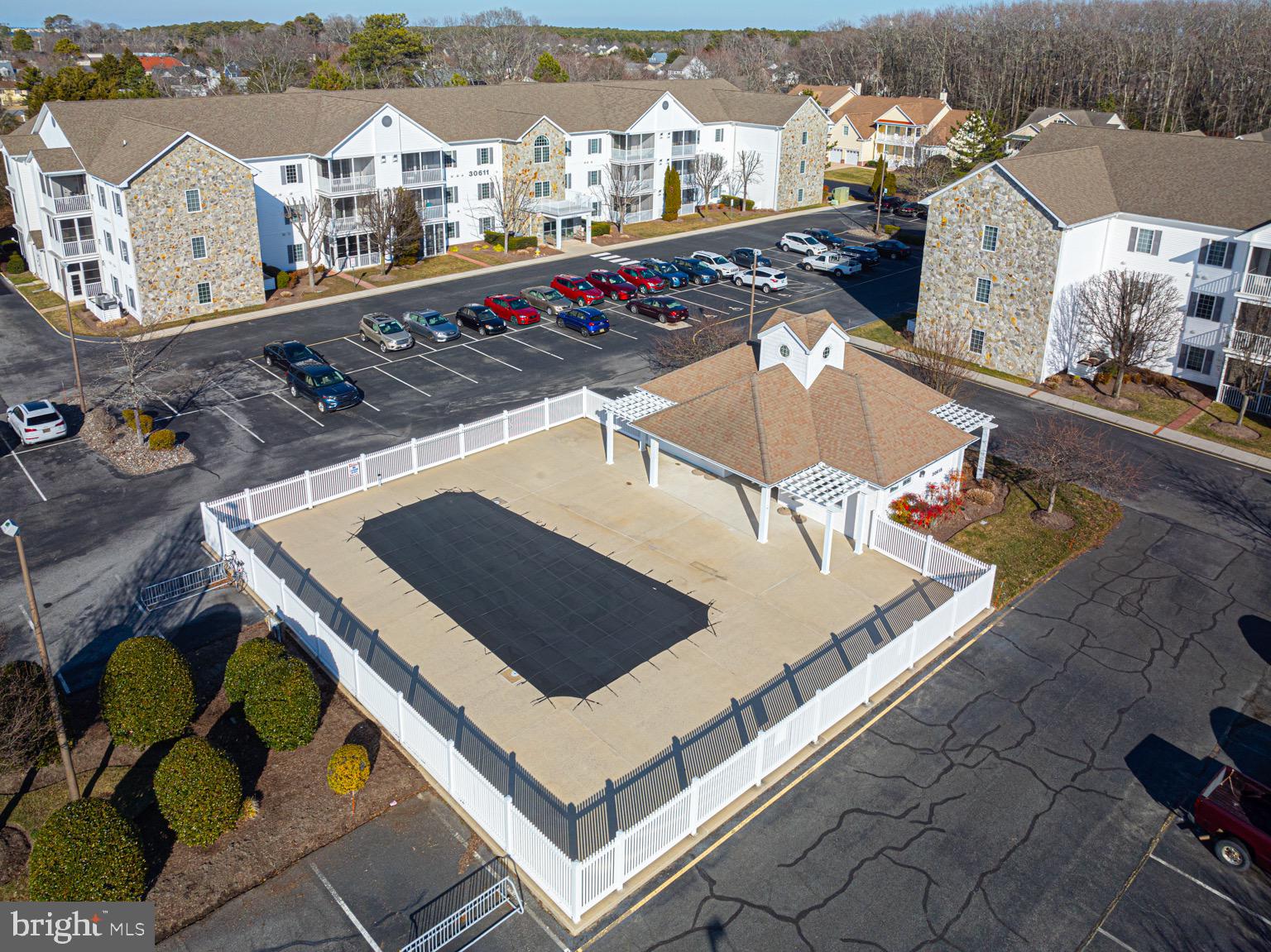 30609 Cedar Neck Road, Unit 3103 Ocean View, DE 19970 - Photo 37 of 39 an aerial view of residential houses with outdoor space