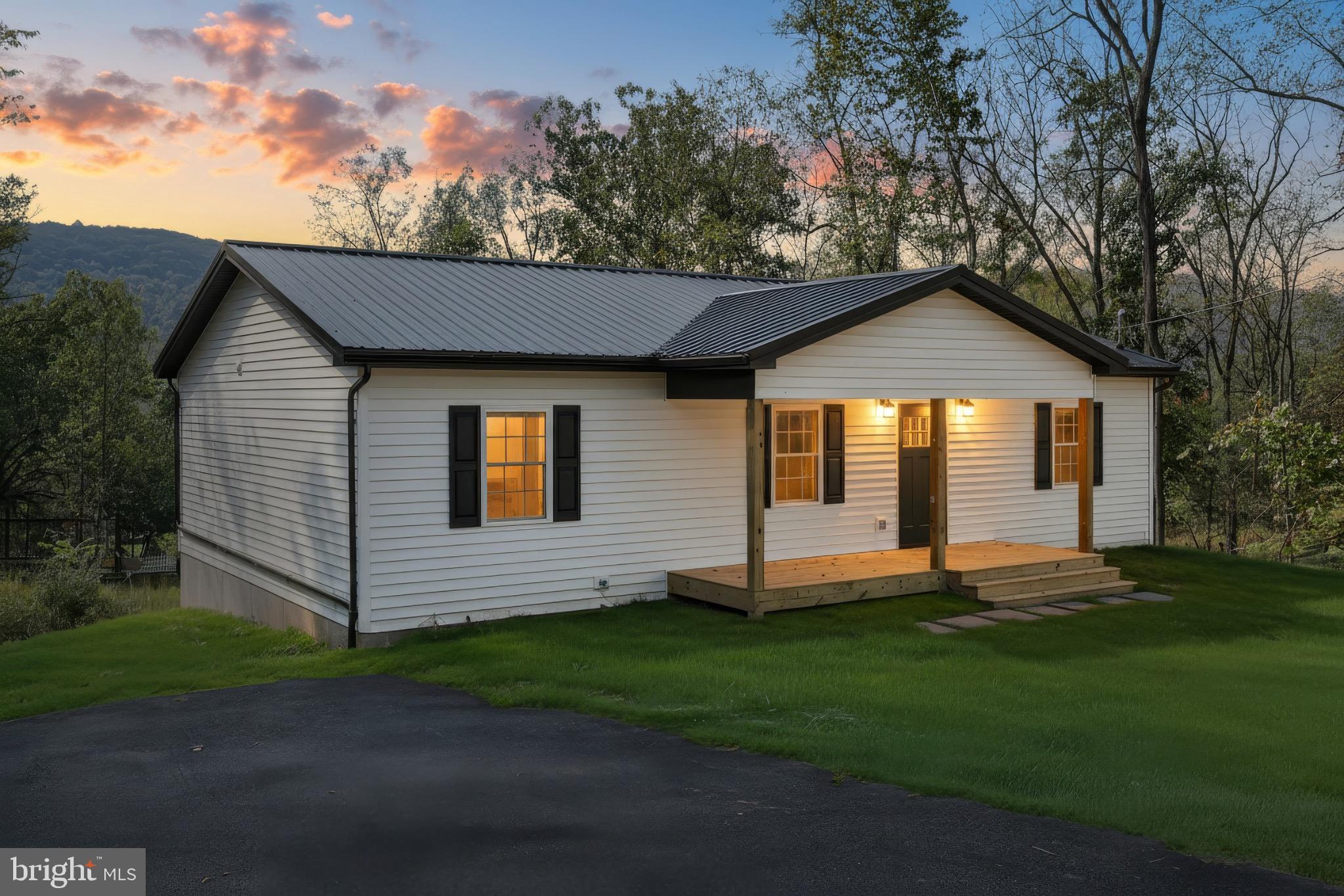 10 Echo Trail Fairfield, PA 17320 - Photo 2 of 43 a front view of a house with a yard and trees