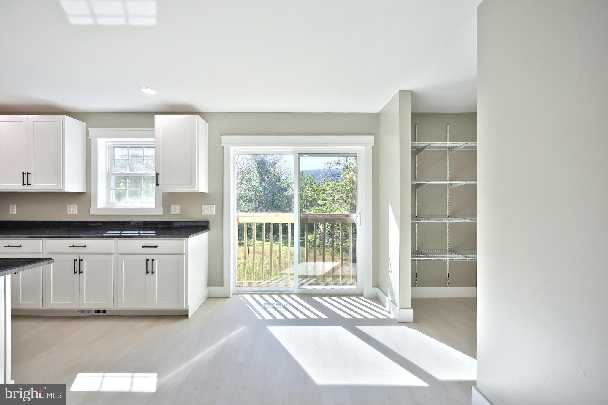 10 Echo Trail Fairfield, PA 17320 - Photo 25 of 43 a view of a kitchen with granite countertop a sink and a window