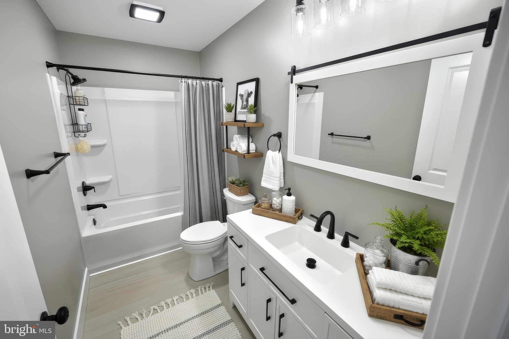 10 Echo Trail Fairfield, PA 17320 - Photo 5 of 43 a bathroom with a sink a toilet and shower