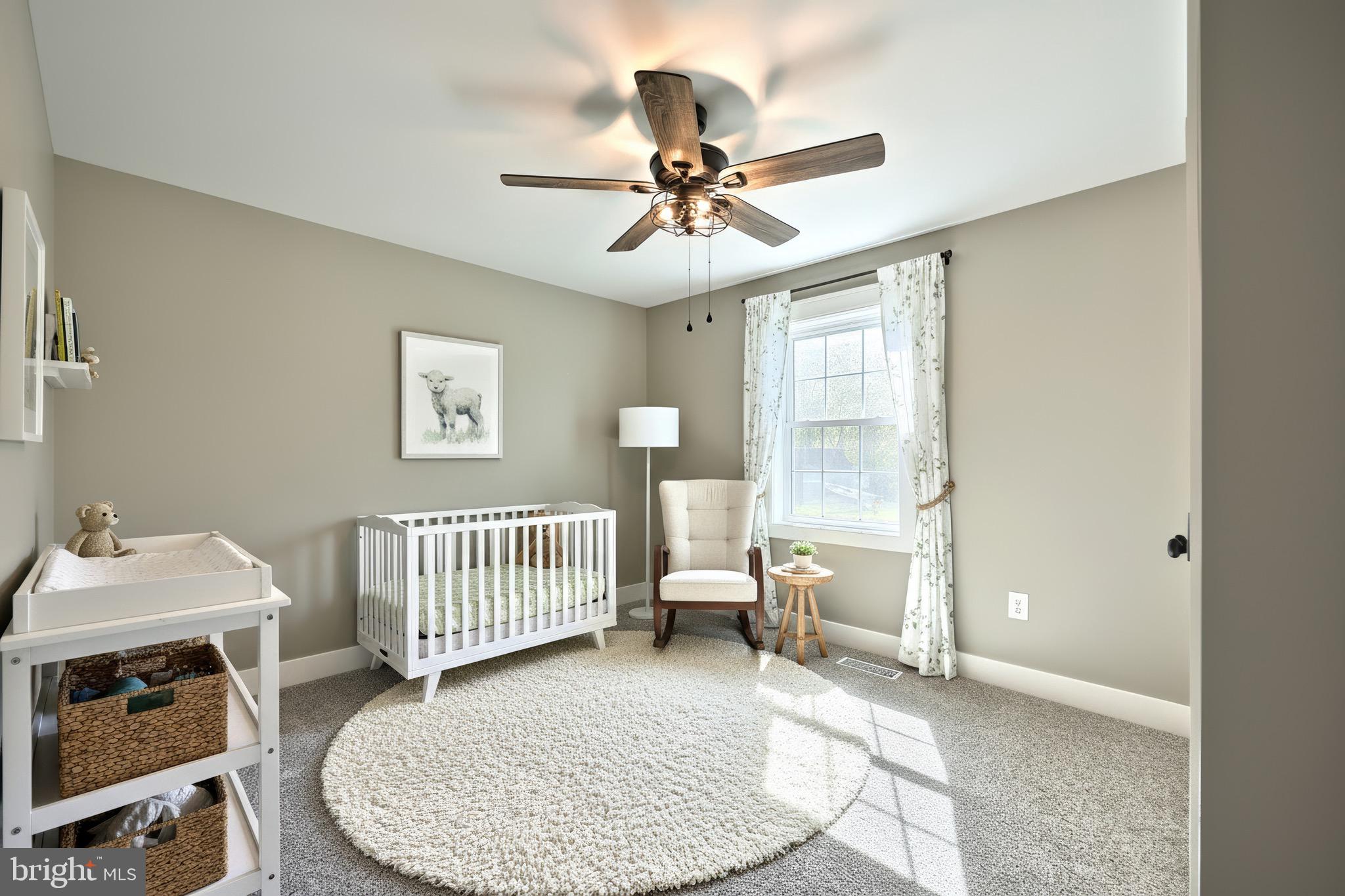 10 Echo Trail Fairfield, PA 17320 - Photo 6 of 43 a bedroom with a bed and a chandelier