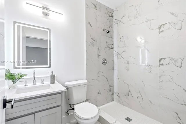 a view of a park with swings and slides