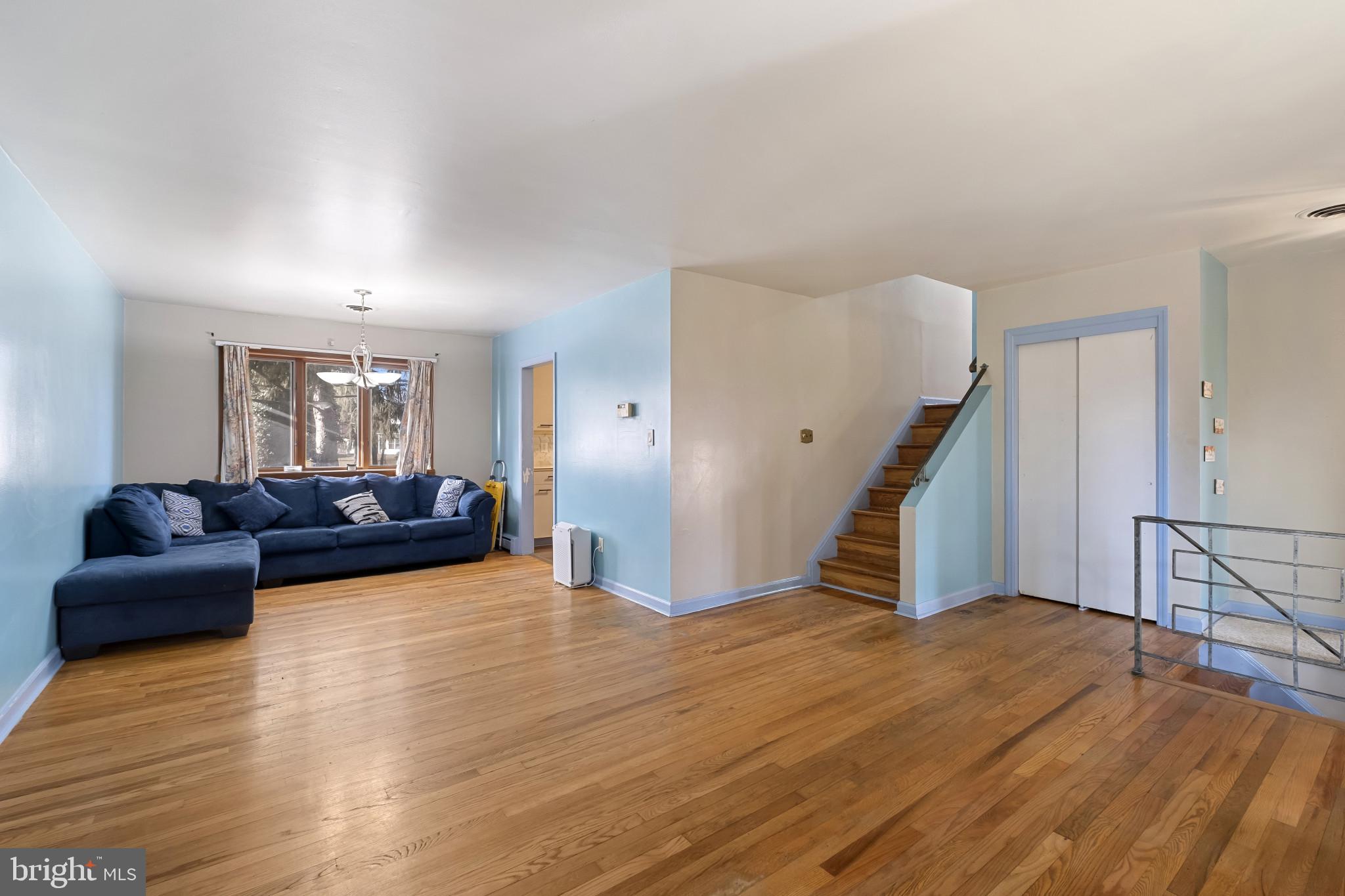 804 Sunset Terrace Dover, DE 19904 - Photo 9 of 33 a living room with furniture and a wooden floor