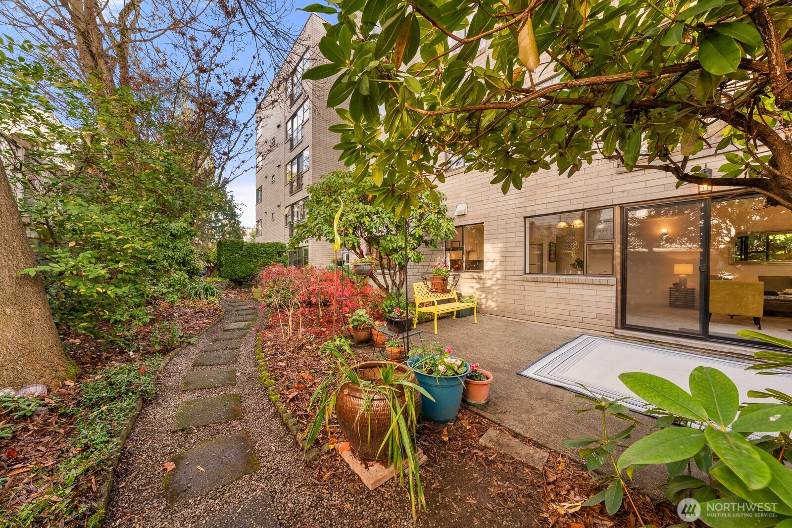 912 3rd Avenue West, Unit 101 Seattle, WA 98119 - Photo 21 of 25 a view of yard with patio
