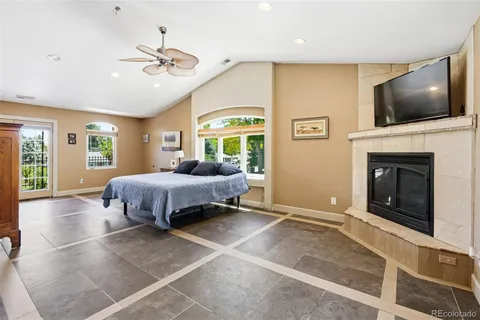 a bedroom with furniture and window