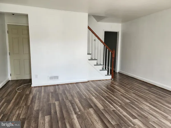 a view of entryway with wooden floor