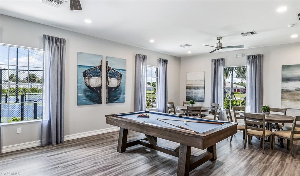 854 Enbrook Loop Naples, FL 34114 - Photo 11 of 18 a view of a livingroom with furniture and window