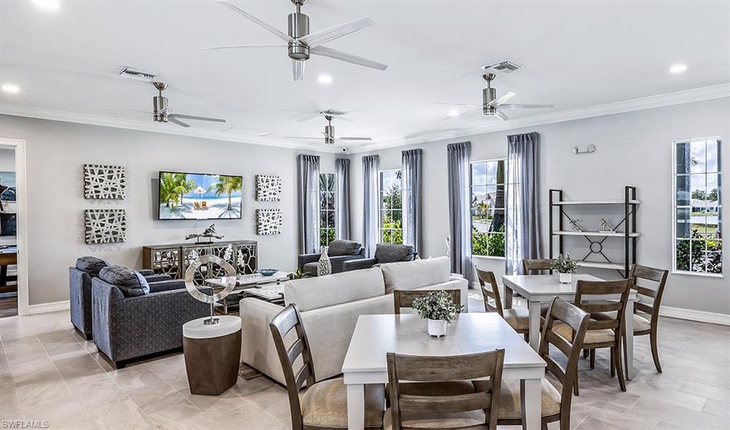 854 Enbrook Loop Naples, FL 34114 - Photo 14 of 18 a view of a dining room with furniture