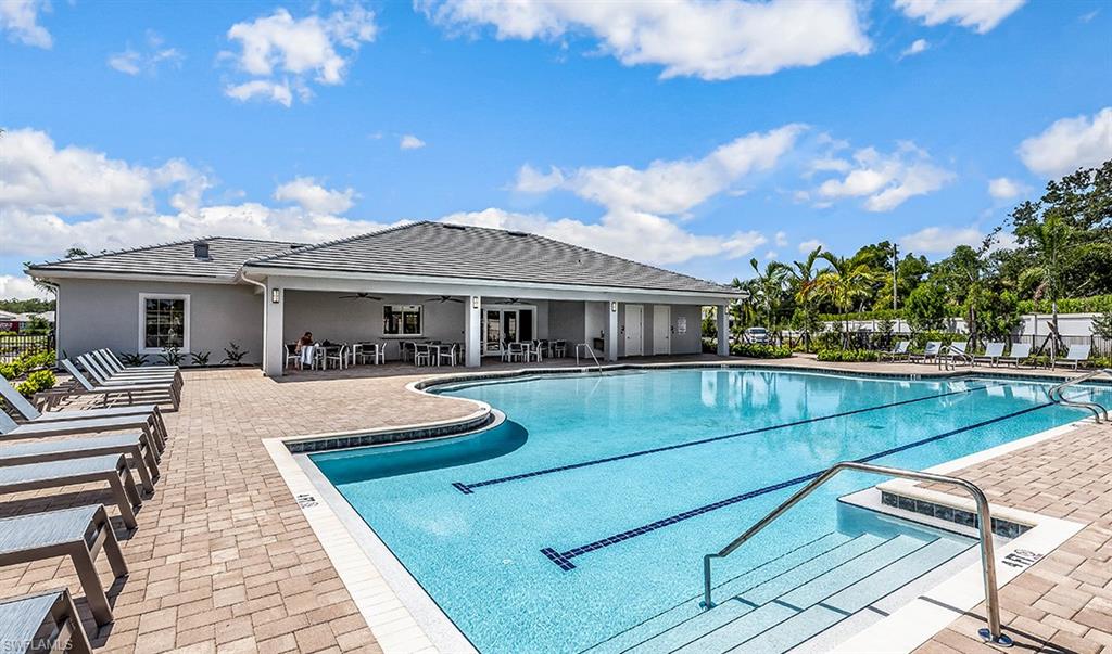 854 Enbrook Loop Naples, FL 34114 - Photo 15 of 18 a view of pool with outdoor seating