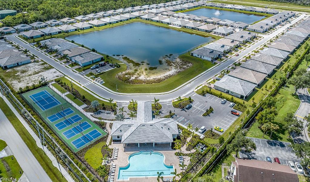 854 Enbrook Loop Naples, FL 34114 - Photo 5 of 18 an aerial view of a house with a ocean view