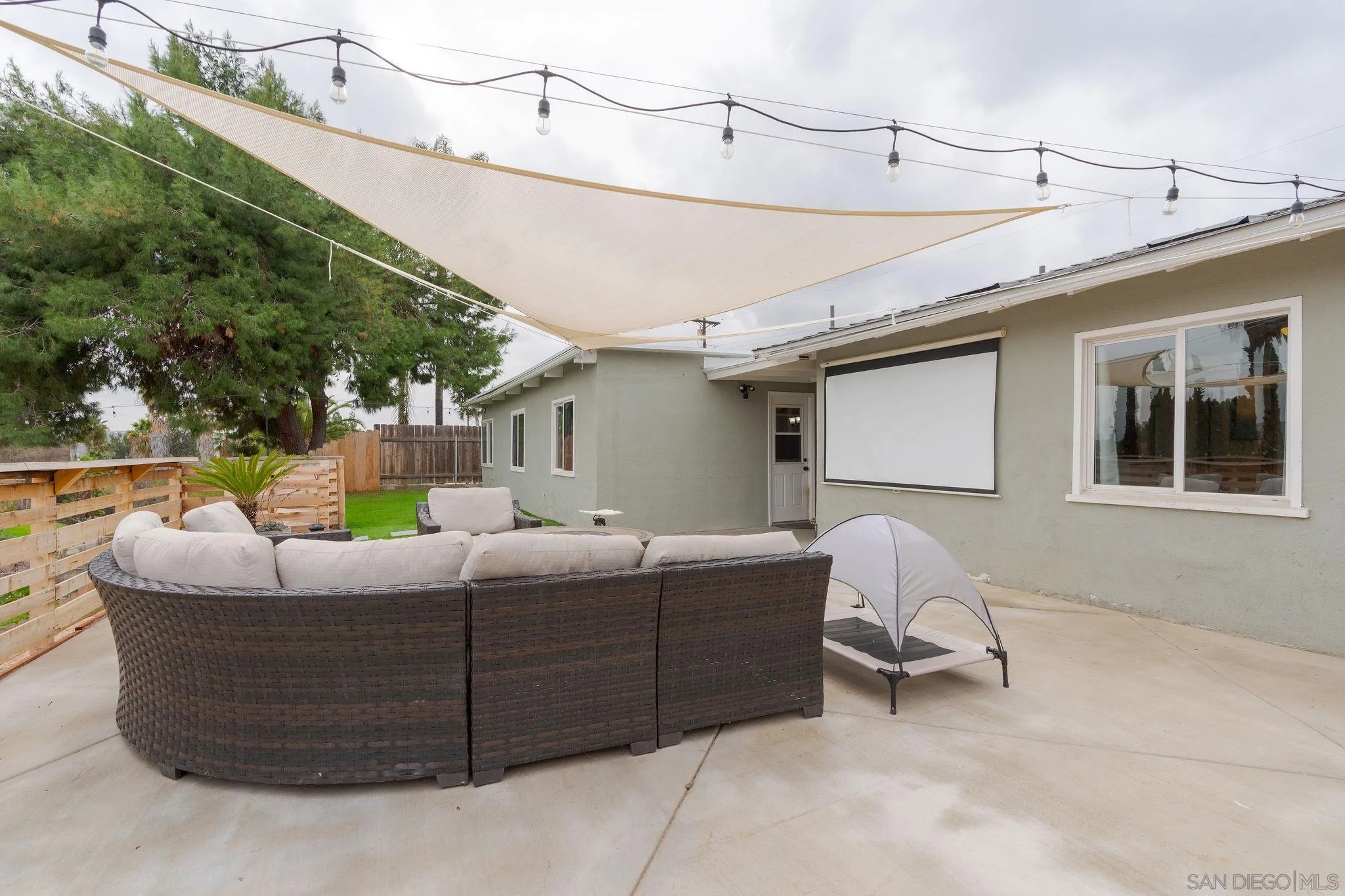 9735 Vomac Road Santee, CA 92071 - Photo 20 of 40 a building outdoor space with patio furniture and potted plants