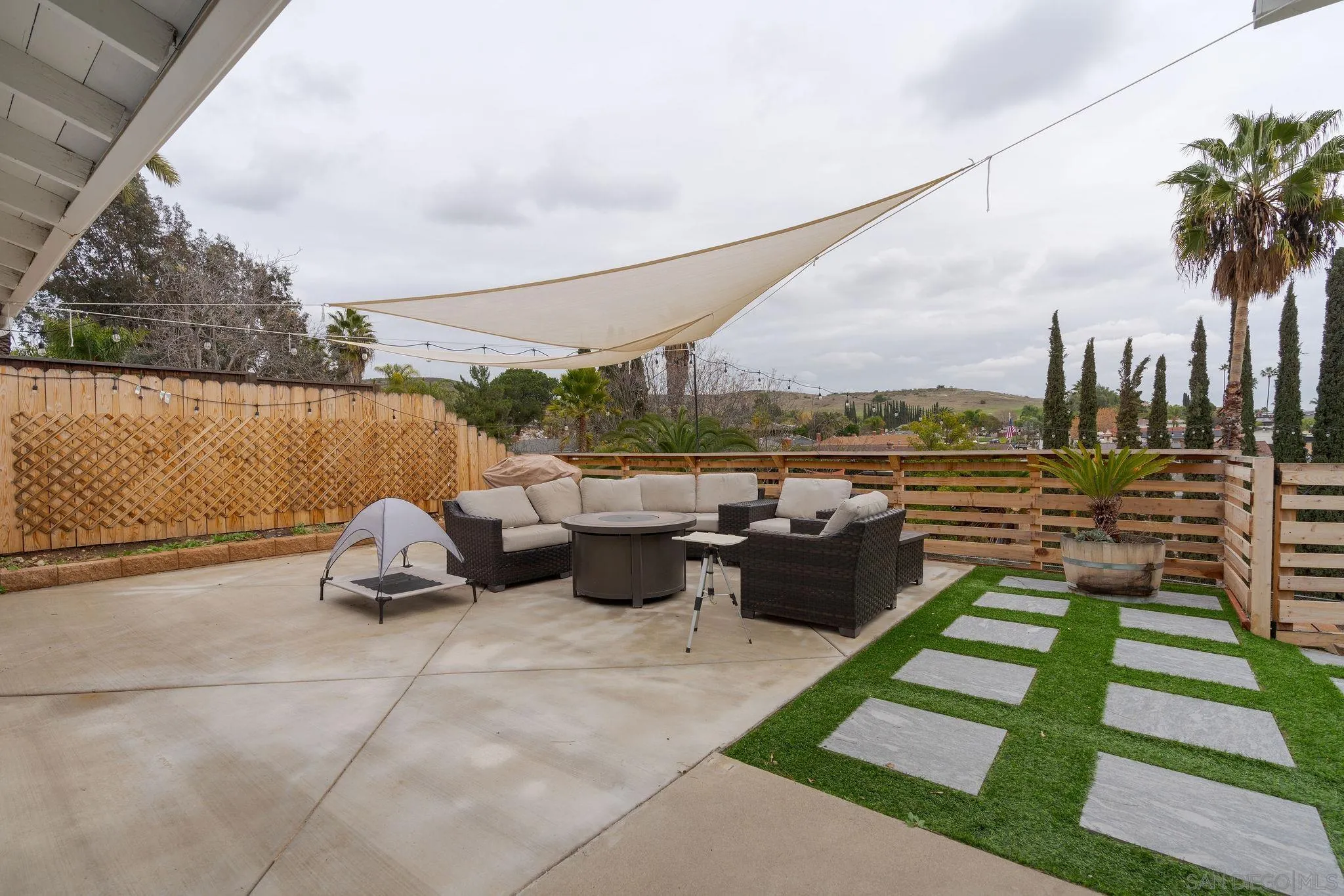 9735 Vomac Road Santee, CA 92071 - Photo 22 of 40 a view of swimming pool with outdoor seating and plants