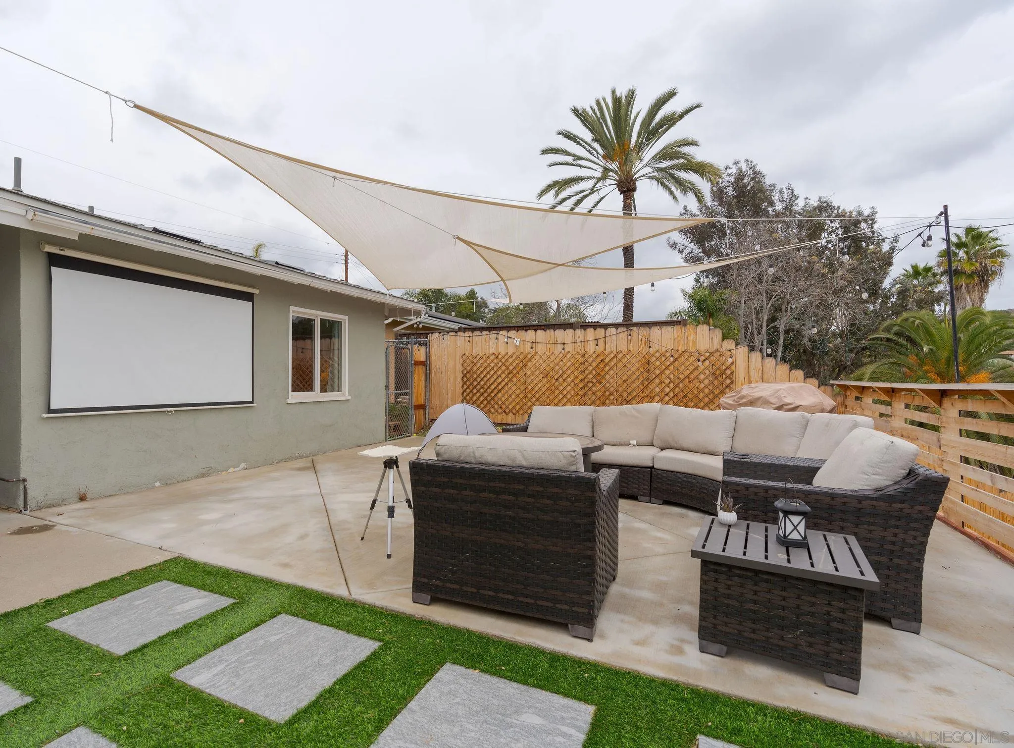 9735 Vomac Road Santee, CA 92071 - Photo 23 of 40 a terrace of a house with outdoor seating
