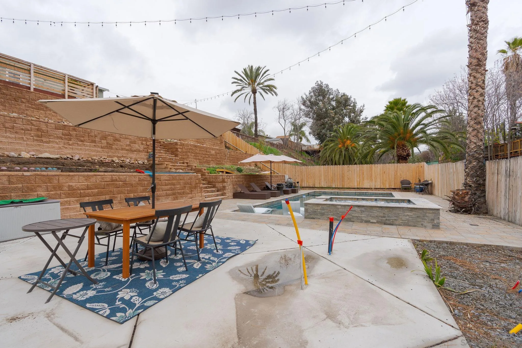 9735 Vomac Road Santee, CA 92071 - Photo 27 of 40 a view of a terrace with sitting area