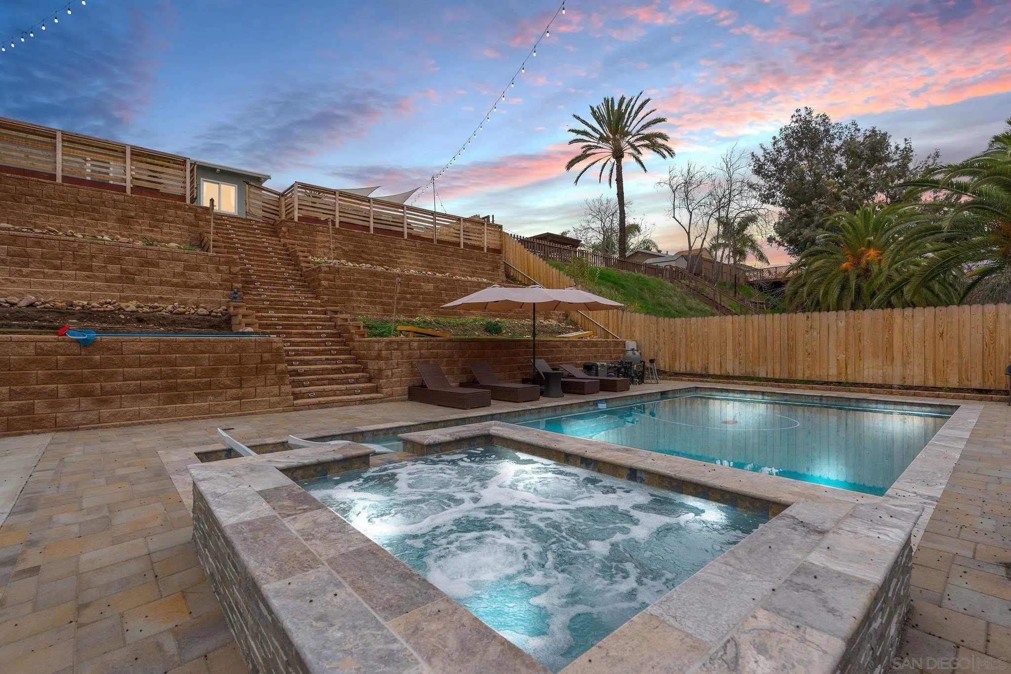 9735 Vomac Road Santee, CA 92071 - Photo 29 of 40 a view of swimming pool with a lounge chairs
