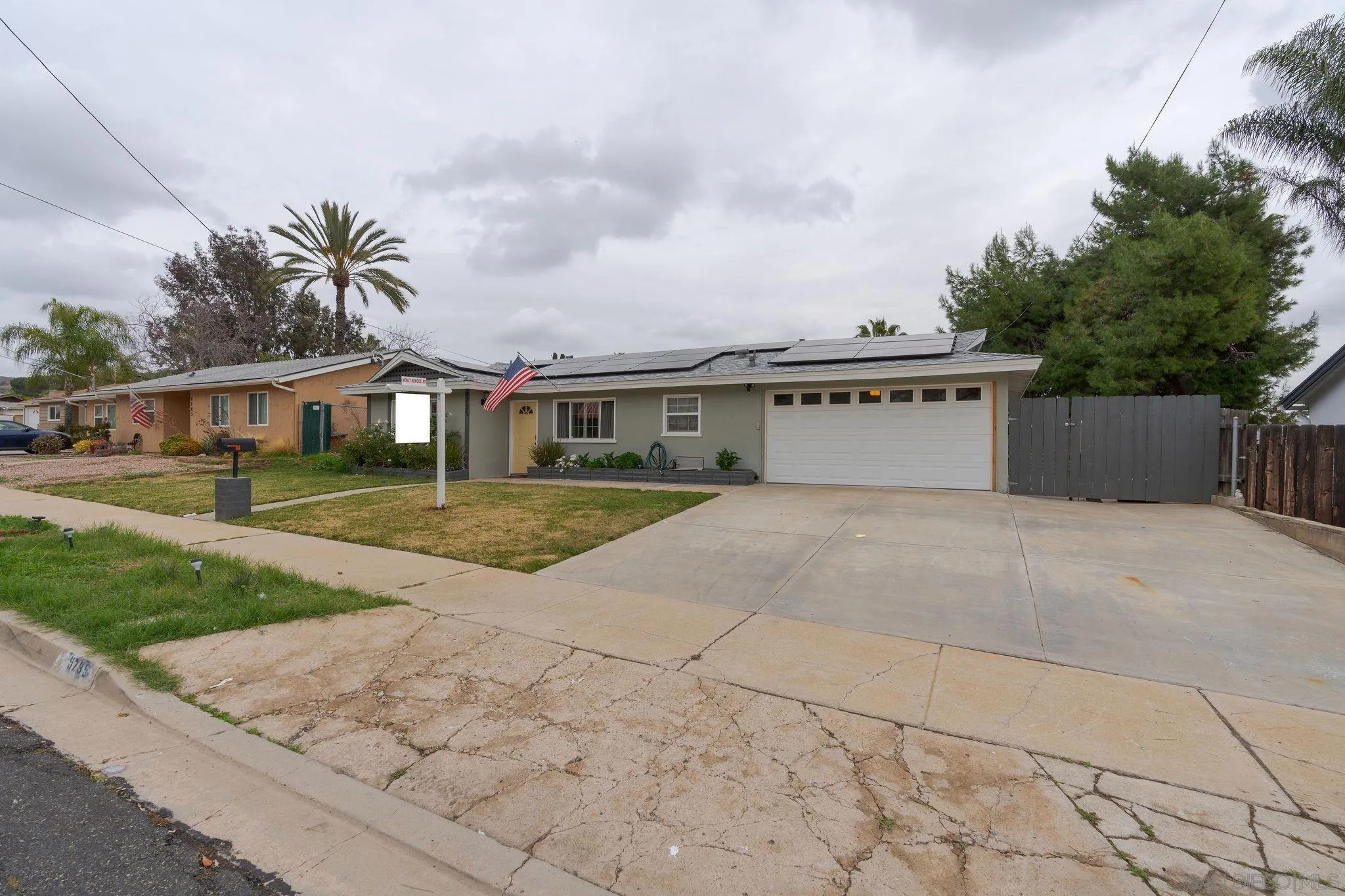 9735 Vomac Road Santee, CA 92071 - Photo 38 of 40 a view of house with yard and entertaining space