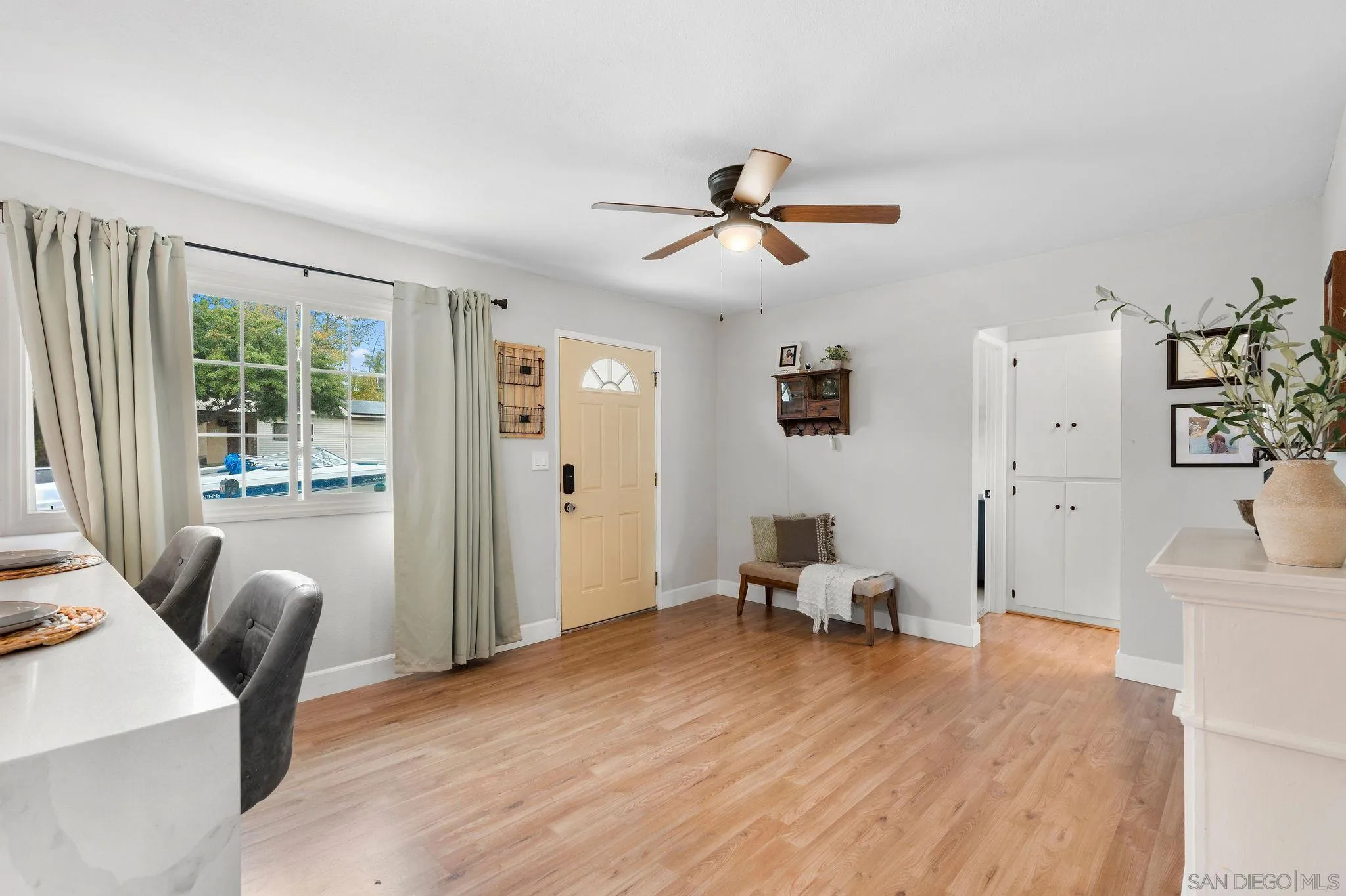 9735 Vomac Road Santee, CA 92071 - Photo 5 of 40 a living room with furniture and a window