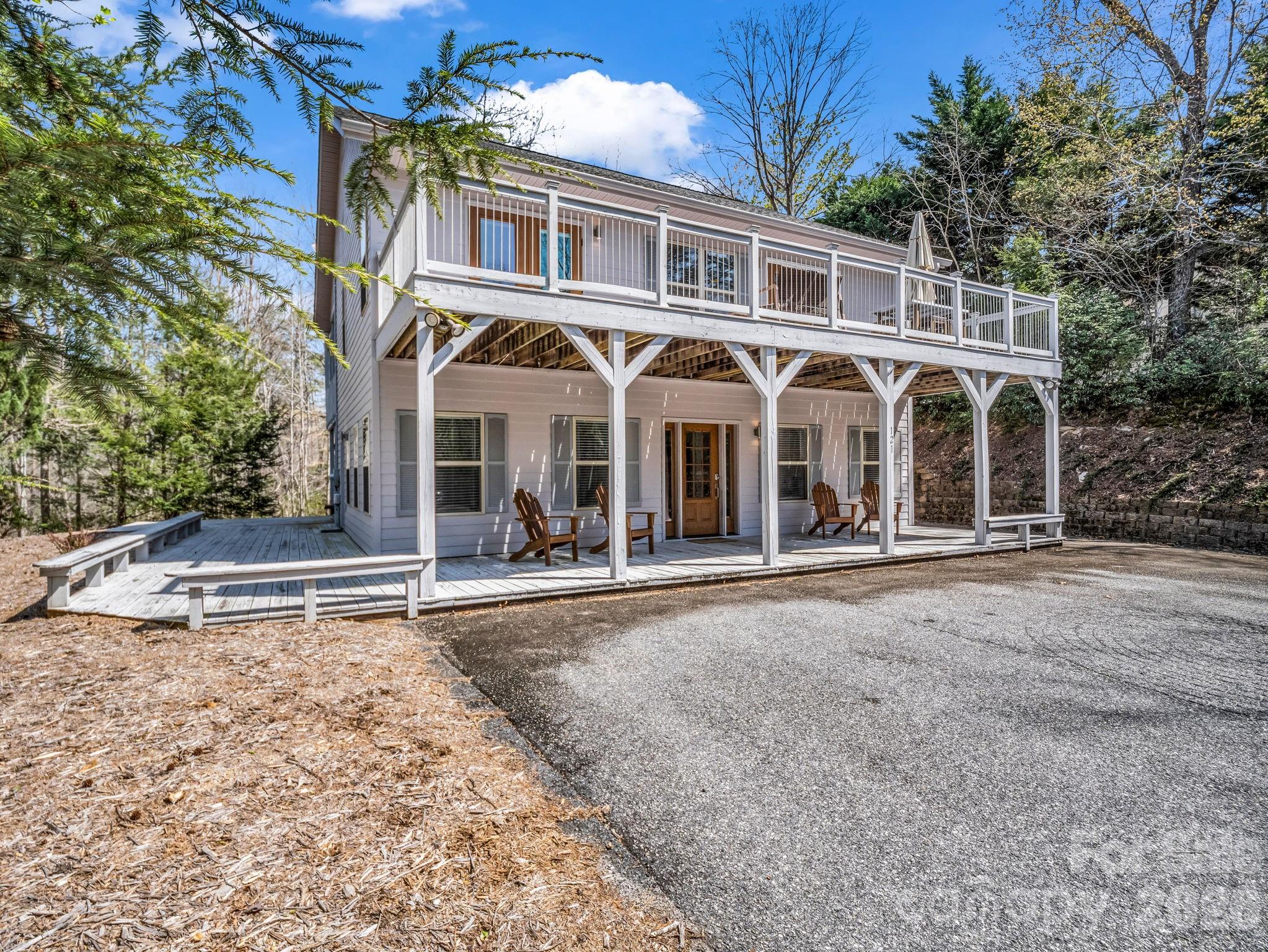 121 Fern Loop Lake Lure, NC 28746 - Photo 2 of 40 front view of a house with a porch