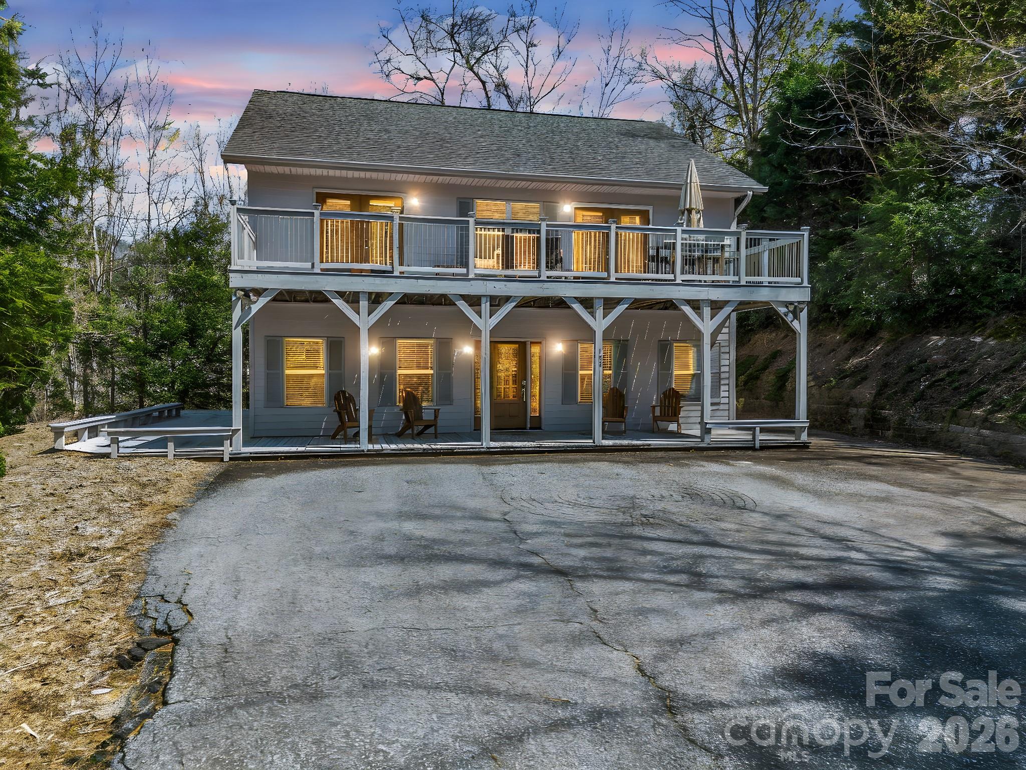 121 Fern Loop Lake Lure, NC 28746 - Photo 3 of 40 a front view of a house with a yard