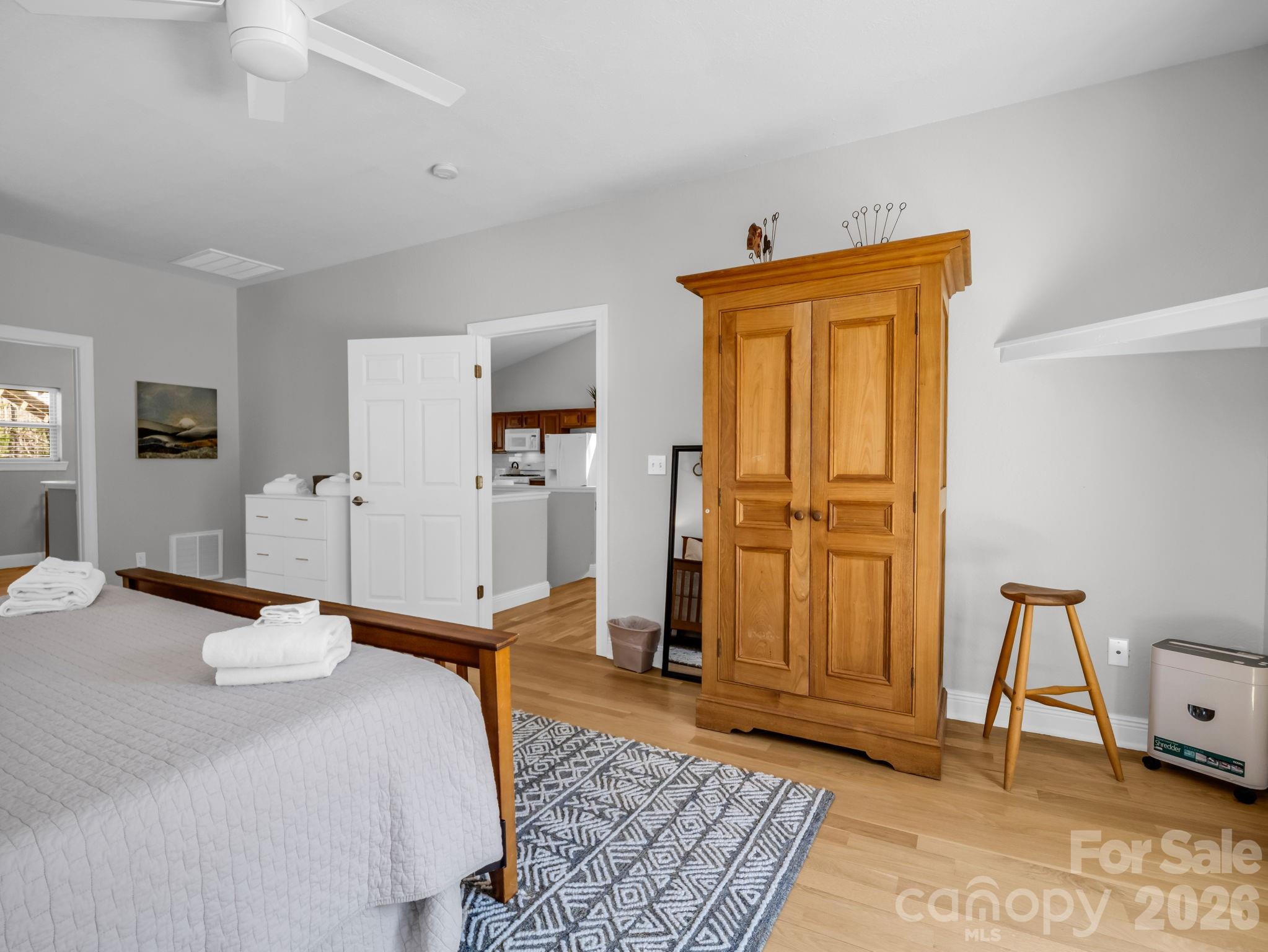 121 Fern Loop Lake Lure, NC 28746 - Photo 33 of 40 a bed room with a bed and mirror