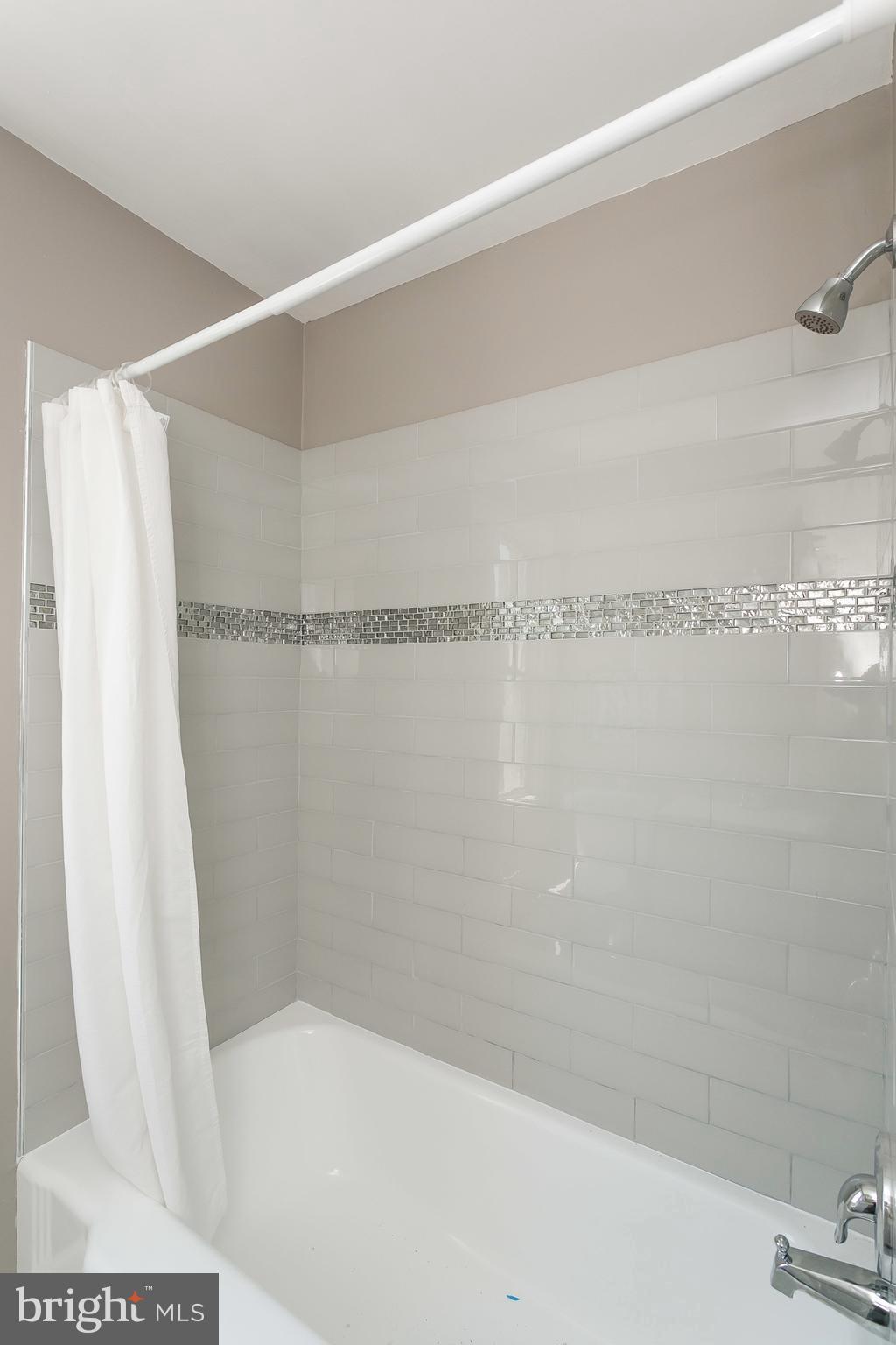 1658 Roundhill Road Baltimore, MD 21218 - Photo 17 of 30 Remodeled Baths with Custom Tile Work