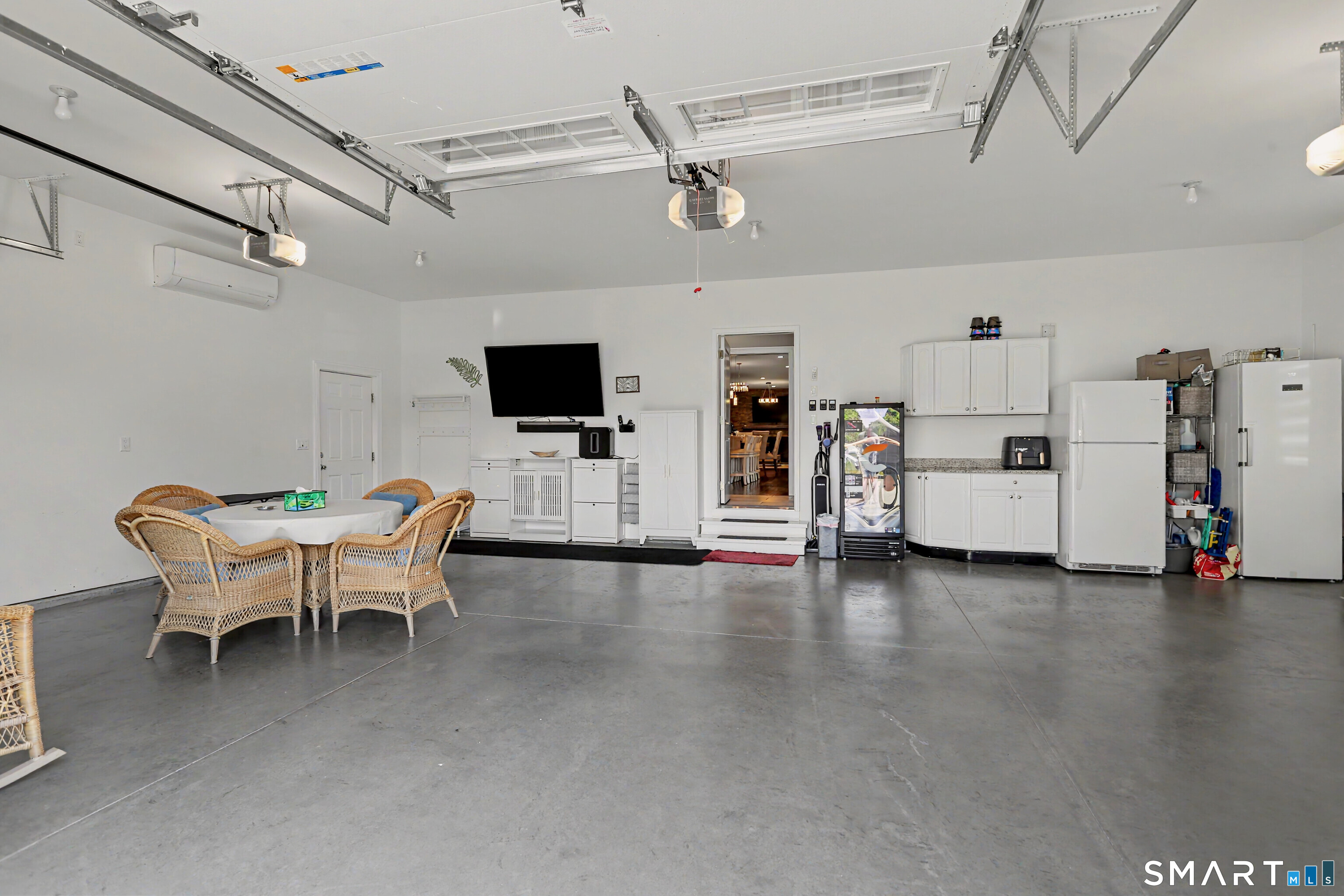 73 Candlewood Road Orange, CT 06477 - Photo 35 of 39 Heated and cooled garage space