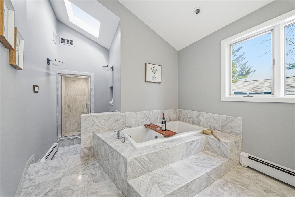 54 Oakvale Road Newton, MA 02468 - Photo 23 of 42 a white bath tub sitting next to a white sink