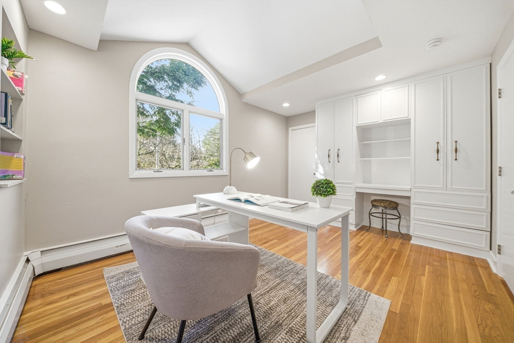 54 Oakvale Road Newton, MA 02468 - Photo 24 of 42 a living room with furniture and a table