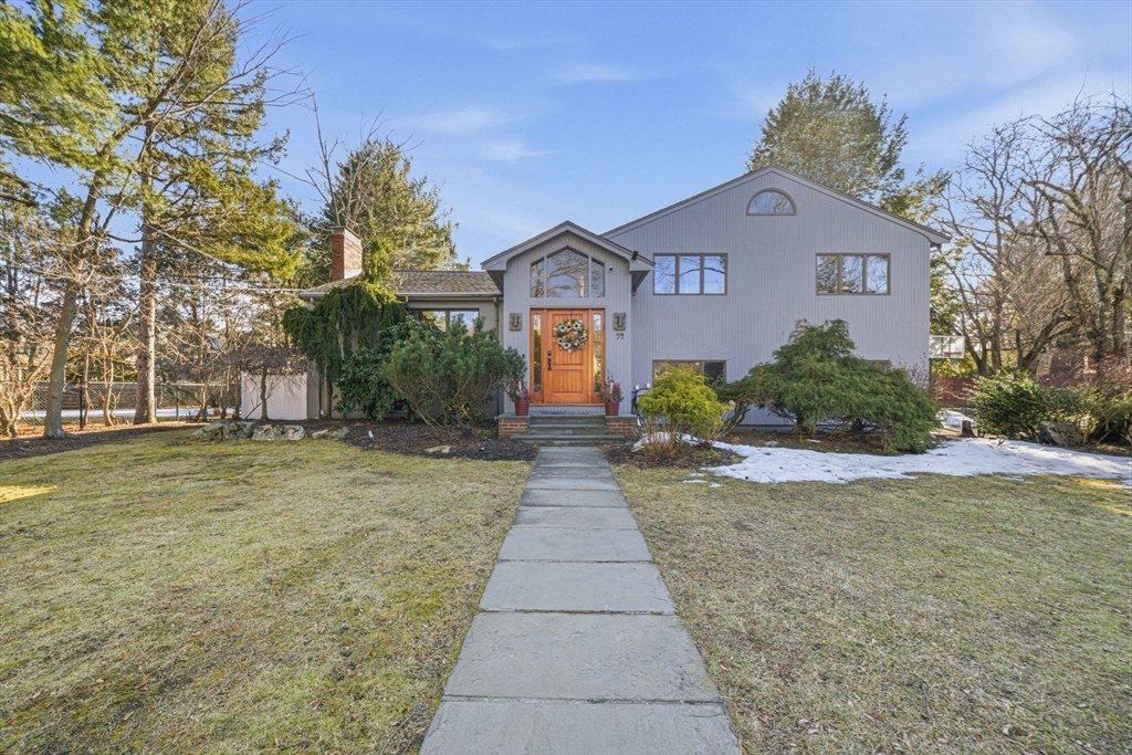 54 Oakvale Road Newton, MA 02468 - Photo 3 of 42 a front view of a house with a yard and trees