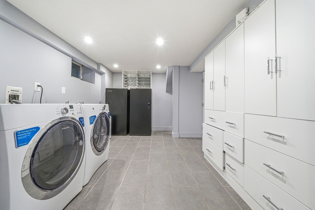 54 Oakvale Road Newton, MA 02468 - Photo 34 of 42 a view of a storage & utility room with washer and dryer