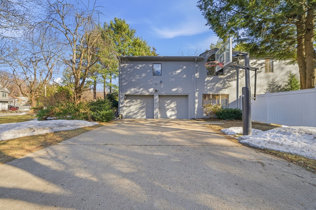 54 Oakvale Road Newton, MA 02468 - Photo 39 of 42 a view of a house with a street