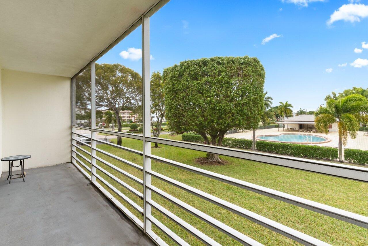228 Brighton F Boca Raton, FL 33434 - Photo 13 of 24 a view of a building from a balcony