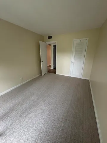 an empty room with closet
