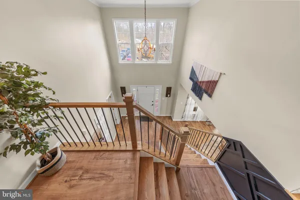 a view of a hallway with staircase