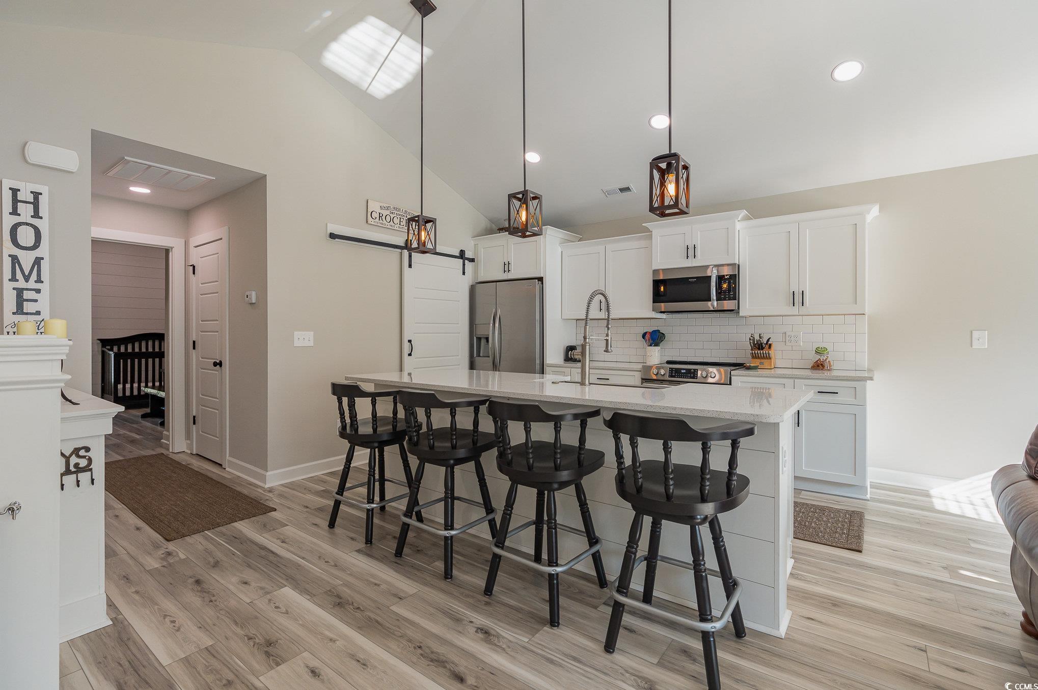 208 Kings Crossing Loop Murrells Inlet, SC 29576 - Photo 11 of 28 Kitchen featuring appliances with stainless steel