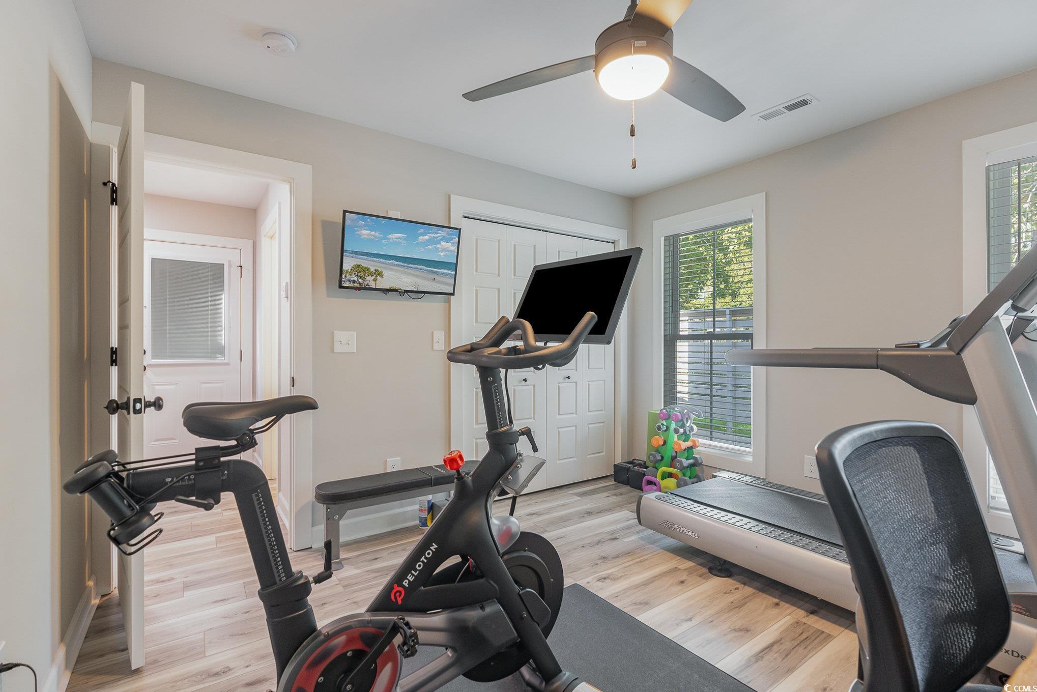 208 Kings Crossing Loop Murrells Inlet, SC 29576 - Photo 19 of 28 Exercise room with ceiling fan and light hardwood