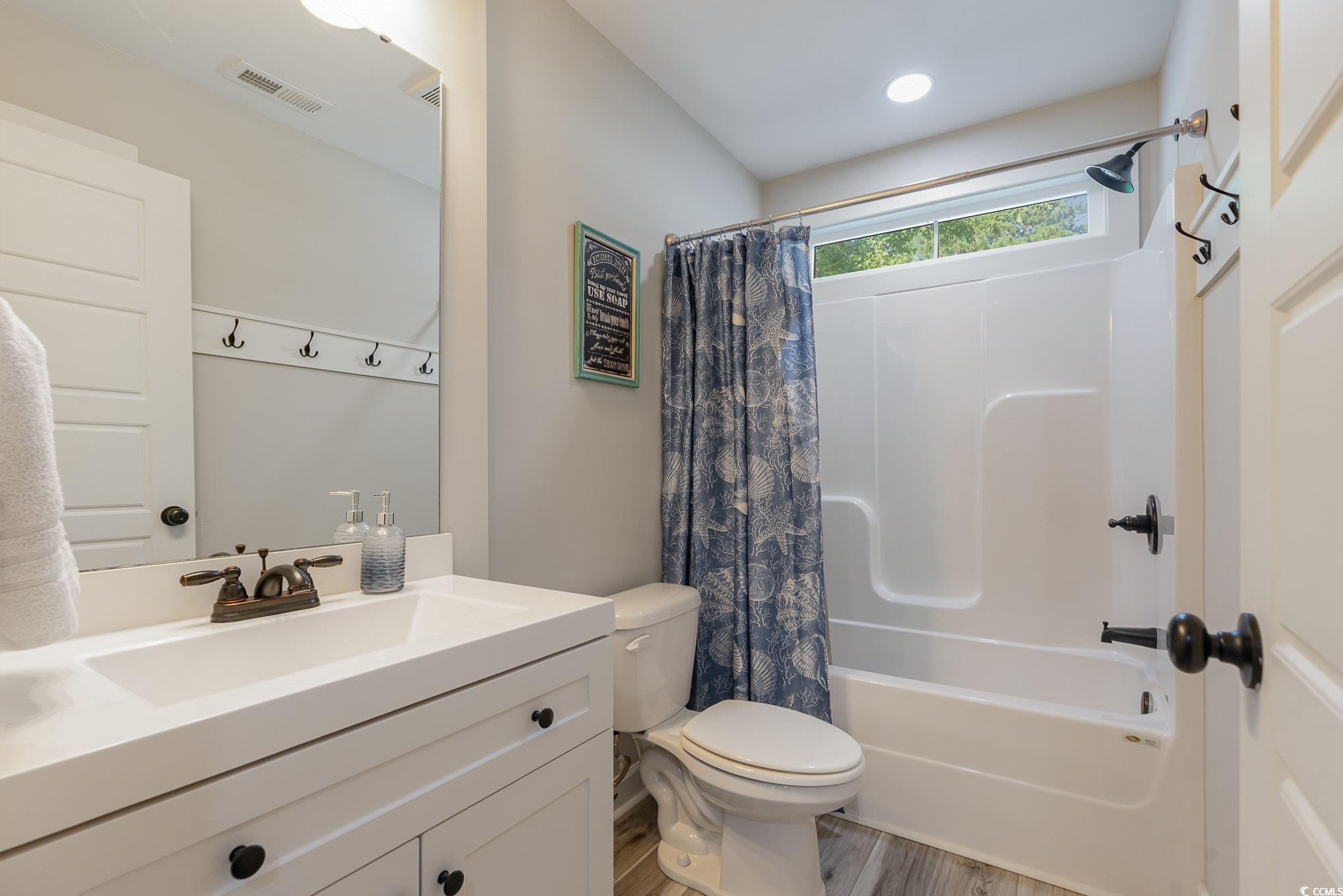 208 Kings Crossing Loop Murrells Inlet, SC 29576 - Photo 20 of 28 Full bathroom featuring wood-type flooring, toilet