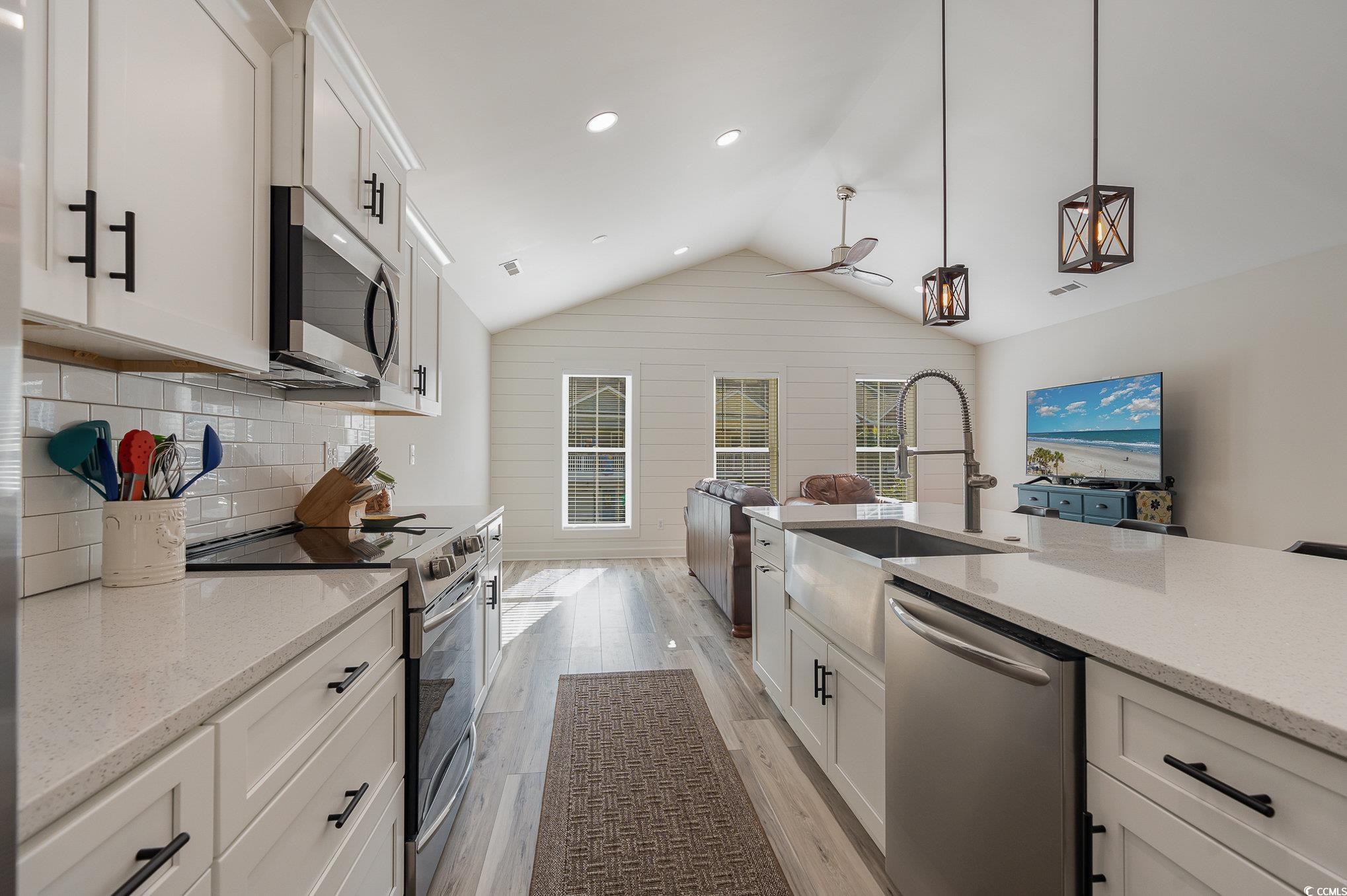208 Kings Crossing Loop Murrells Inlet, SC 29576 - Photo 9 of 28 Kitchen featuring light hardwood / wood-style floo