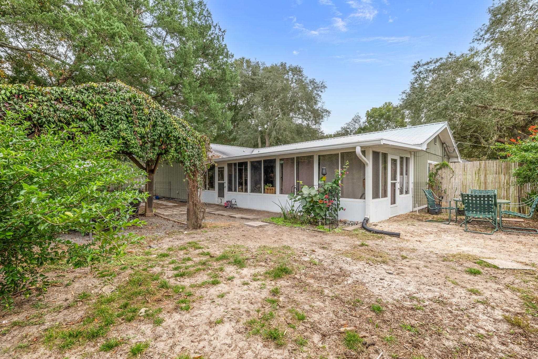 129 Pelican Road St. Augustine, FL 32086 - Photo 25 of 35 a view of a house with a yard