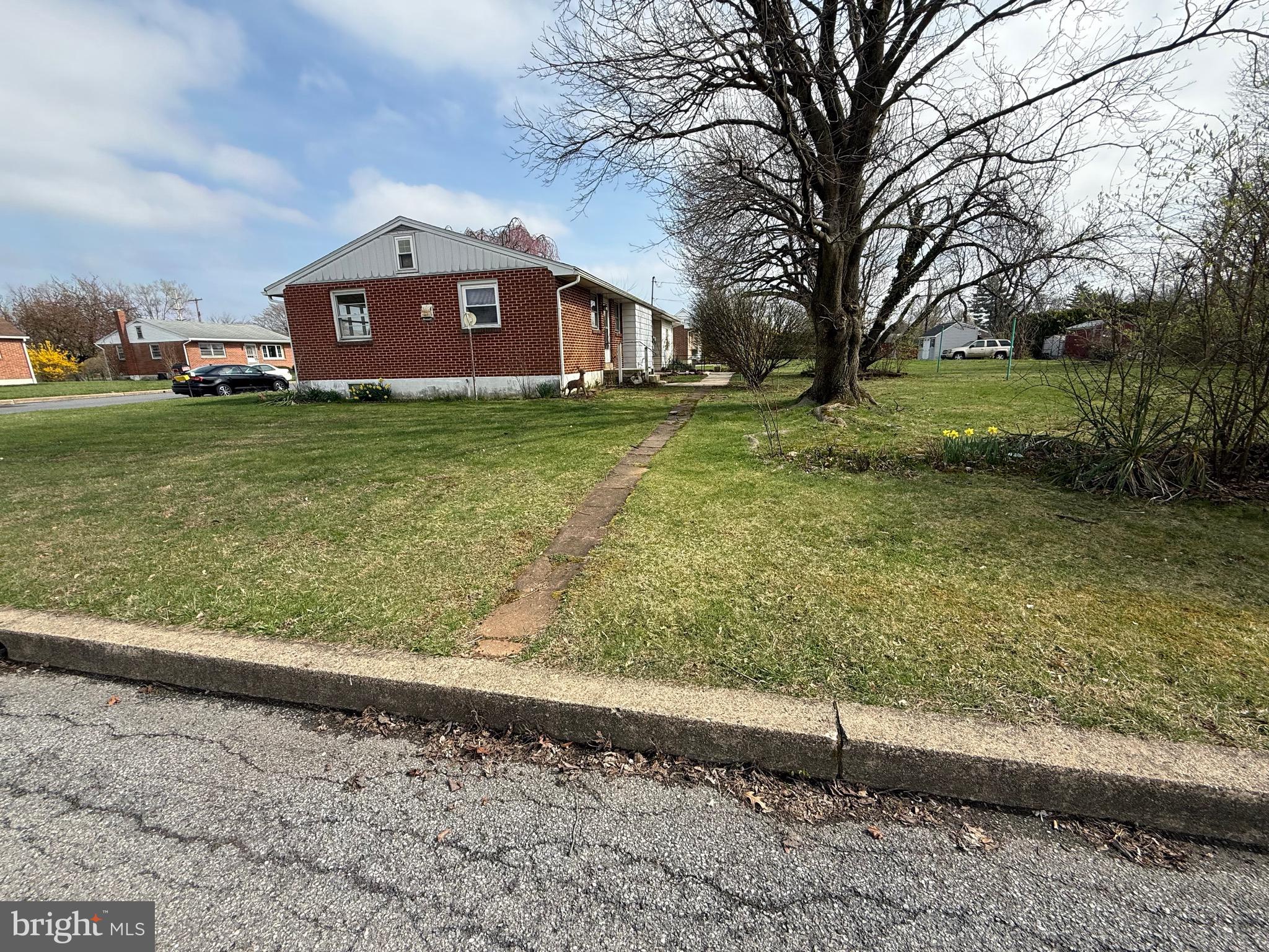 3508 Sheidy Avenue Reading, PA 19605 - Photo 2 of 14 a view of a house with a yard