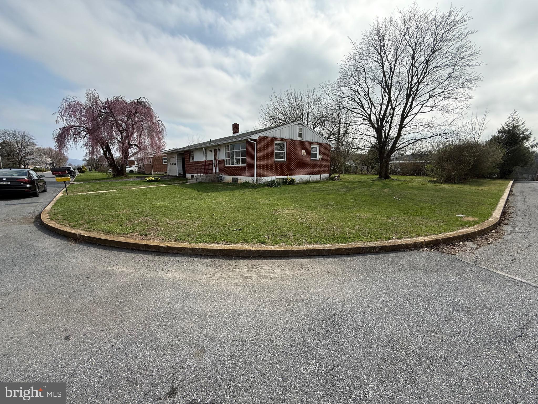 3508 Sheidy Avenue Reading, PA 19605 - Photo 4 of 14 a view of a house with a yard