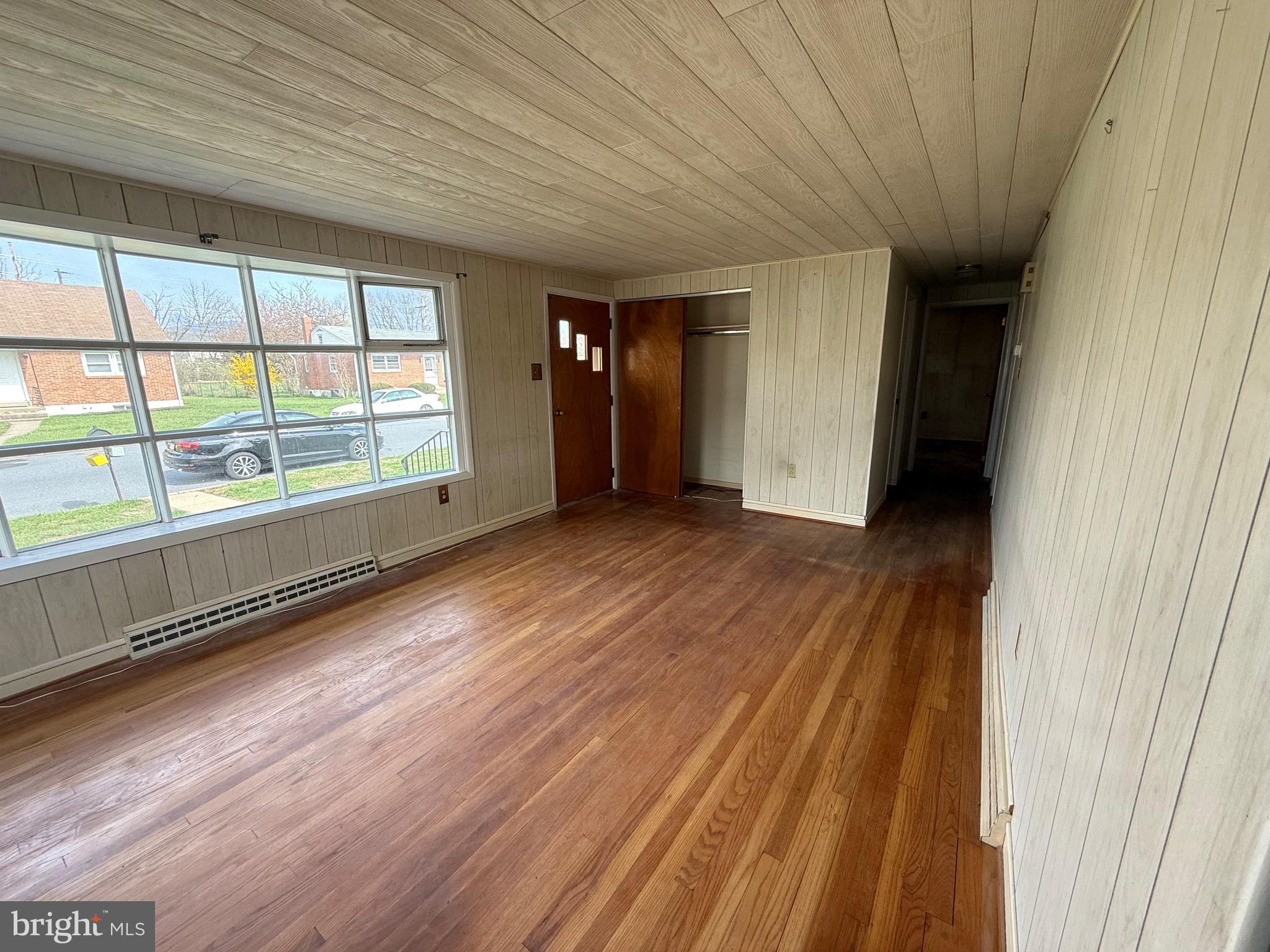 3508 Sheidy Avenue Reading, PA 19605 - Photo 5 of 14 a view of wooden floor and windows in a room